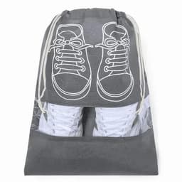A drawstring bag in grey with a shoe graphic on the front, featuring white sneakers inside.