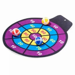 A dartboard mat with a colourful target design and four small balls in yellow, red, blue, and white.