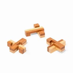 A set of three wooden puzzle pieces in varying shapes, showcasing natural wood grains and finishes.