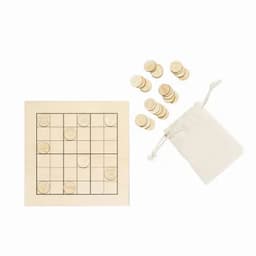 A game set featuring a grid, wooden tokens, and a white drawstring bag, all in natural colours.
