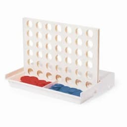 A Connect Four game with a white frame, featuring red and blue discs in separate trays.