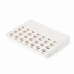 A white product holder with multiple circular compartments for organisation and storage. Features a simple design.