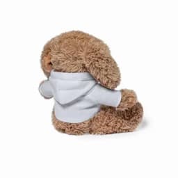 A plush bunny toy with fluffy brown fur, wearing a light grey hoodie, sitting upright.