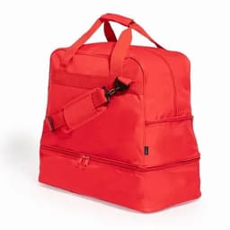 A red travel bag with dual handles, a detachable shoulder strap, and multiple zip compartments.