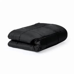 A folded black quilt featuring a quilted design, showcasing a soft and smooth texture.