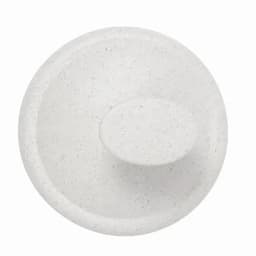 A drink bottle lid in a speckled white colour, featuring a raised centre and a smooth round shape.