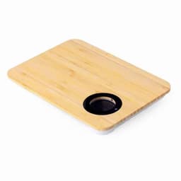 A bamboo cutting board featuring a round black section, ideal for food preparation.