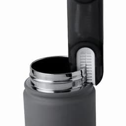 A drink bottle in matte grey with a silver stainless steel lid and a black opening mechanism.