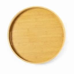 A round bamboo tray with a smooth surface and raised edges, showcasing its natural timber colour.