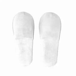 A pair of white, soft slippers with a stitched edge, featuring a simple and clean design.
