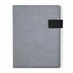 A grey notebook with a textured cover and a black strap closure. It features a simple, minimalist design.