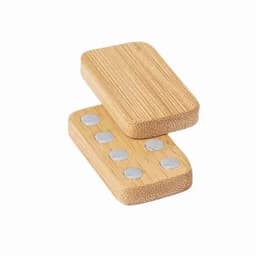 A set of bamboo coasters stacked together, featuring round metal discs embedded on the surface.
