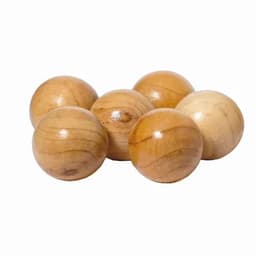 A set of six polished wooden balls in varying shades of light brown and cream, stacked closely together.