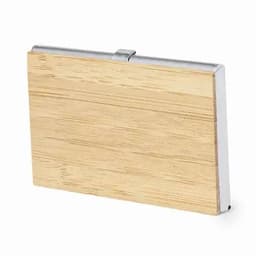 A wooden business card holder with a silver metallic clasp. It features a smooth, natural wood finish.