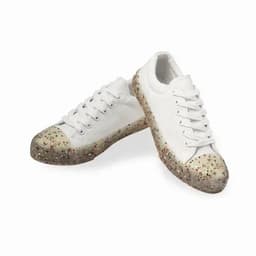 A pair of white sneakers with a speckled, translucent sole in various colours. The shoes feature laces and a casual design.