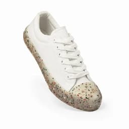 A white sneaker with a speckled translucent sole, featuring a lace-up design and a round toe.