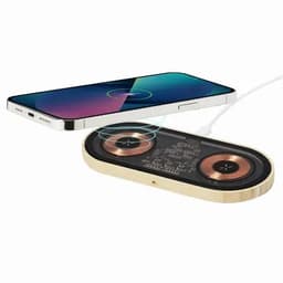 A wireless charger with a wooden base and two circular charging pads, alongside a smartphone in vibrant colours.