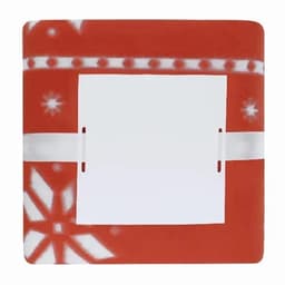A red and white patterned blanket with a section for a label or tag in the centre.