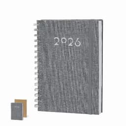 A grey spiral-bound notebook with the year '2026' printed on the cover, alongside a smaller notebook.