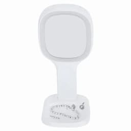 A compact, white mirror with a square face and a base, featuring a small tray for accessories like earrings.