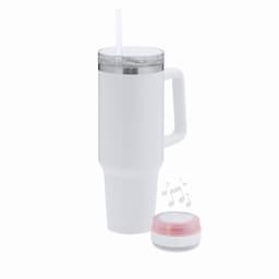 A white drink bottle with a handle and a lid, accompanied by a small pink and white speaker.