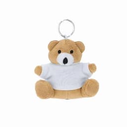 A keychain featuring a small, brown teddy bear wearing a white shirt. The bear has a round face and small limbs.