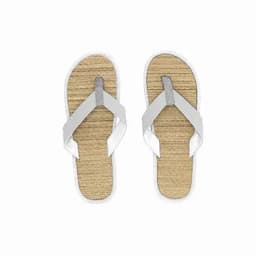 A pair of flip-flops with a white strap and a straw-like sole. The soles are textured and light brown.