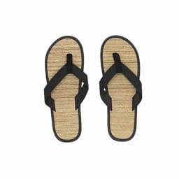 A pair of black flip-flops with a textured gold-like footbed and black straps.