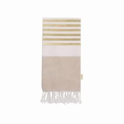 A decorative towel featuring white and beige stripes with gold accents and fringed edges.