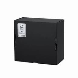 A black packaging box with a logo, featuring flaps on the sides and a label.