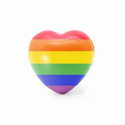 A heart-shaped object featuring rainbow stripes in vibrant colours of red, orange, yellow, green, blue, and purple.
