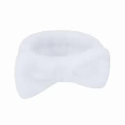 A white headband with a bow detail, made of soft fabric, featuring a branding logo.