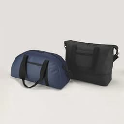 A set of two bags in navy blue and black, featuring handles and a zip closure. One has a rounded shape, while the other is rectangular.