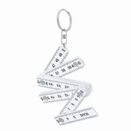 A keyring measuring tape in white, featuring multiple foldable sections with metric and imperial measurements.
