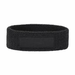 A black wristband made of a textured fabric with a blank rectangular section.