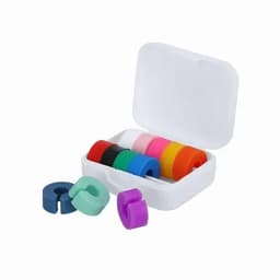 A set of colourful silicone rings in various shades, displayed in a white, lidded case.