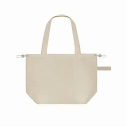 A beige tote bag with dual handles and side fastenings, featuring a simple design and a logo.
