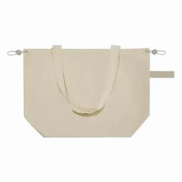 A tote bag in cream colour with two handles and a simple design. It features a logo on one side.