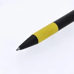 A black pen with a textured yellow grip and a silver tip. It features a simple design and has branding.