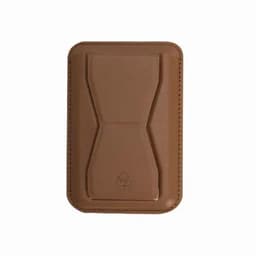 A cardholder with a tan, textured finish featuring a simple bow design and a logo on the bottom.