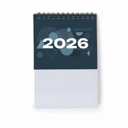 A desk calendar featuring a dark cover with geometric designs and large numbers "2026" on the front.