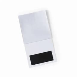 A folded magnet calendar in white with a black magnetic strip at the bottom and a blank upper area.