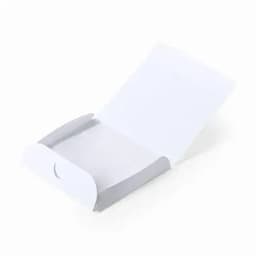 A white, open packaging box with a grey base, designed for holding products securely.