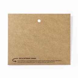 A brown card with a hole at the top, featuring biodegradable paper and a description of interior contents.