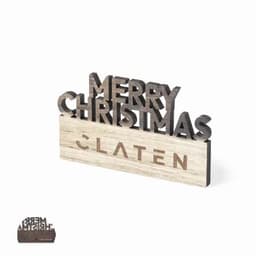 A decorative wooden sign featuring "Merry Christmas" in black lettering on a light wooden base, with a logo present.