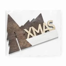 A wooden Christmas decoration with trees and the word "XMAS" in brown and white tones.
