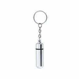 A silver cylindrical keychain container with a keyring attached. It has a sleek, shiny finish.