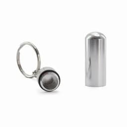 A metallic bottle opener on a keychain next to a sleek silver cap. The product features a shiny finish.