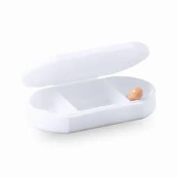 A white pill case with a hinged lid, holding a single orange capsule inside.