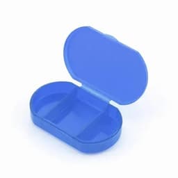 A blue pill organiser with two compartments and an open lid, made of transparent plastic.